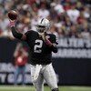 HOUSTON - OCTOBER 04:  Quarterback JeMarcus Russell #2 of the Oakland Raiders throws a pass against the Houston Texans at Reliant Stadium on October 4, 2009 in Houston, Texas.  (Photo by Bob Levey/Getty Images)