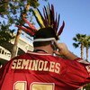 MIAMI GARDENS, FL - JANUARY 3:  A Florida State Seminoles fan talks on his cell phone before  the Fed Ex Orange Bowl with the Penn State Nittany Lions at Dolphins Stadium on January 3, 2005 in Miami Gardens, Florida. The Lions won 26-23 in triple overtime