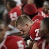 HOUSTON - SEPTEMBER 26: Quarterback Case Keenum #7 of the Houston Cougars sits on the bench while UH plays against the Texas Tech Red Raiders at Robertson Stadium on September 26, 2009 in Houston, Texas.  (Photo by Thomas B. Shea/Getty Images)