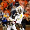 AUBURN, AL - SEPTEMBER 19:  Quarterback Jarrett Brown #16 and Noel Devine #7 of the West Virginia Mountaineers against the Auburn Tigers at Jordan-Hare Stadium on September 19, 2009 in Auburn, Alabama.  (Photo by Kevin C. Cox/Getty Images)