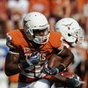 AUSTIN, TX - SEPTEMBER 26:  Running back D.J. Monroe #26 of the Texas Longhorns at Darrell K Royal-Texas Memorial Stadium on September 26, 2009 in Austin, Texas.  (Photo by Ronald Martinez/Getty Images)
