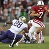PALO ALTO, CA - SEPTEMBER 26:  Toby Gerhart #7 of the Stanford Cardinal runs for a touchdown against Tony Chidac #28 of the Washington Huskies at Stanford Stadium on September 26, 2009 in Palo Alto, California.  (Photo by Jed Jacobsohn/Getty Images)