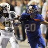 BOISE, ID - SEPTEMBER 3:  Willie Glasper #17 of the Oregon Ducks battles for position with Mitch Burroughs #20 of the Boise State as a pass is thrown in second quarter of the game on September 3, 2009 at Broncos Stadium in Boise, Idaho. Boise State won th