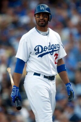 LOS ANGELES, CA - OCTOBER 08:  Matt Kemp #27 of the Los Angeles Dodgers reacts after striking out in the fourth inning against the St. Louis Cardinals in Game Two of the NLDS during the 2009 MLB Playoffs at Dodger Stadium on October 8, 2009 in Los Angeles