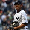 NEW YORK - SEPTEMBER 27:  Mariano Rivera #42 of the New York Yankees celebrates after his team defeated the Boston Red Sox on September 27, 2009 at Yankee Stadium in the Bronx borough of New York City. The Yankees won the game 4-2 to earn their 100th win 