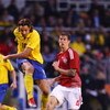 SOLNA, SWEDEN - JUNE 06:  Zlatan ibrahimovic (L) of Sweden shoots past Daniel Agger (R) of Denmark during the FIFA2010 World Cup Qualifying Group 1 match between Sweden and Denmark at the Rasunda Stadium on June 6, 2009 in Solna, Sweden.  (Photo by Michae