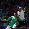 MEXICO CITY - AUGUST 12:  Jonny Magallon #2 of Mexico and Charlie Davies #9 of the USA clash for the ball during the FIFA World Cup Qualifying soccer match between the USA and Mexico at Azteco Stadium August 12, 2009 in Mexico City, Mexico.  (Donald Miral