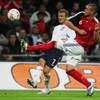 LONDON - AUGUST 22: Christian Pander of Germany takes the ball from David Beckham of England during the international friendly match between England and Germany at Wembley stadium on August 22, 2007 in London, England.  (Photo by Martin Rose/Bongarts/Gett