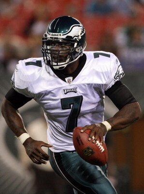 EAST RUTHERFORD, NJ - SEPTEMBER 03:  Michael Vick #7 of the Philadelphia Eagles looks to throw a pass against the New York Jets on September 3, 2009 at Giants Stadium in East Rutherford, New Jersey. The Jets defeated the Eagles 38-27.  (Photo by Jim McIsa