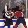 13 Feb 2002: Bob Probert #24 of the Chicago Blackhawks and Peter Worrell #8 of the Florida Panthers exchange punches during the game at United Center in Chicago , Illinois. The Blackhawks won 5-4. DIGITAL IMAGE. Mandatory Credit : Jonathan Daniel/Getty Im