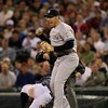 SEATTLE - SEPTEMBER 18:  Mark Teixeira #25 of the New York Yankees reacts after Ichiro Suzuki #51 of the Seattle Mariners was tagged out at first base on a pick off play on September 18, 2009 at Safeco Field in Seattle, Washington. (Photo by Otto Greule J