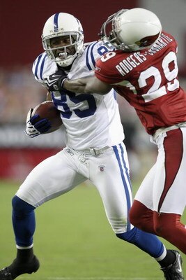GLENDALE, AZ - SEPTEMBER 27:  Pierre Garcon #85 of the Indianapolis Colts runs after a catch in the fourth quarter as he battles for more yards against Dominique Rodgers-Cromartie #29 of the Arizona Cardinals during the game at University of Phoenix Stadi