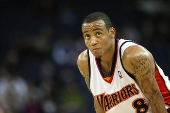 OAKLAND, CA - MARCH 30:  Monta Ellis #8 of the Golden State Warriors looks on against the Memphis Grizzlies during an NBA game on March 30, 2009 at Oracle Arena in Oakland, California. NOTE TO USER: User expressly acknowledges and agrees that, by download
