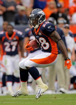 DENVER - SEPTEMBER 20:  Running back Correll Buckhalter #28 of the Denver Broncos rushes for a 45 yard touchdown against the Cleveland Browns during NFL action at Invesco Field at Mile High on September 20, 2009 in Denver, Colorado. The Broncos defeated t