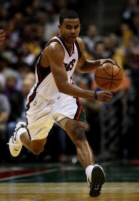 MILWAUKEE - FEBRUARY 07: Ramon Sessions #7 of the Milwaukee Bucks brings the ball upcourt against the Detroit Pistons on February 7, 2009 at the Bradley Center in Milwaukee, Wisconsin. The Pistons defeated the Bucks 126-121 in overtime. NOTE TO USER: User