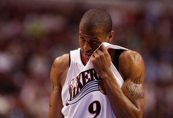 PHILADELPHIA - MAY 01:  Andre Iguodala #9 of the Philadelphia 76ers wipes sweat from his face against the Detroit Pistons in Game Six of the Eastern Conference Quarterfinals during the 2008 NBA Playoffs on May 1, 2008 at the Wachovia Center in Philadelphi