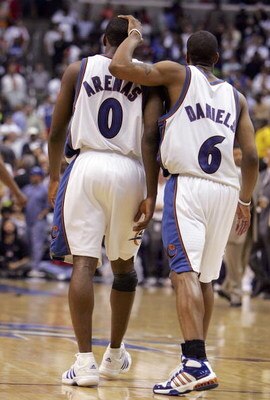 WASHINGTON - MAY 05:  Antonio Daniels #6 of the Washington Wizards consoles teammate Gilbert Arenas #0 after Arenas missed 2 free throws with 15 seconds left in overtime of game six of the Eastern Conference Quarterfinals against the Cleveland Cavaliers d