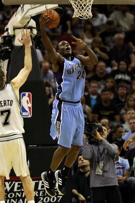 SAN ANTONIO - MAY 22:  Paul Milsap #24 of the Utah Jazz lays the ball up against the San Antonio Spurs during Game Two of the Western Conference Finals during the 2007 NBA Playoffs at AT&T Center on May 22, 2007 in San Antonio, Texas. NOTE TO USER: User e