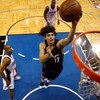 ORLANDO, FL - MAY 30:  Anderson Varejao #17 of the Cleveland Cavaliers drives to the hoop against Rafer Alston #1 and Rashard Lewis #9 of the Orlando Magic in Game Six of the Eastern Conference Finals during the 2009 Playoffs at Amway Arena on May 30, 200