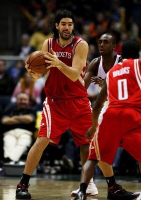 MILWAUKEE - FEBRUARY 09: Luis Scola #4 of the Houston Rockets looks to pass against the Milwaukee Bucks on February 9, 2009 at the Bradley Center in Milwaukee, Wisconsin. The Bucks defeated the Rockets 124-112. NOTE TO USER: User expressly acknowledges an