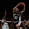 NEW ORLEANS - MAY 13:  Manu Ginobili #20 of the San Antonio Spurs shoots over David West #30 of the New Orleans Hornets in Game Five of the Western Conference Semifinals during the 2008 NBA Playoffs at The New Orleans Arena on May 13, 2008 in New Orleans,