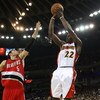 OAKLAND, CA - NOVEMBER 18:  Anthony Morrow #22 of the Golden State Warriors shoots over Rudy Fernandez #5 of the Portland Trail Blazers during an NBA game on November 18, 2008 at Oracle Arena in Oakland, California. NOTE TO USER: User expressly acknowledg