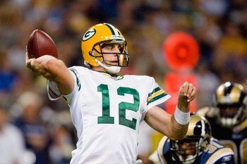 ST. LOUIS, MO - SEPTEMBER 27:  Aaron Rodgers #12 of the Green Bay Packers passes during the game against the St. Louis Rams at the Edward Jones Dome on September 27, 2009 in St. Louis, Missouri.  (Photo by Dilip Vishwanat/Getty Images)