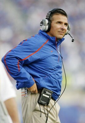 LEXINGTON, KY - SEPTEMBER 26:  Head coach Urban Meyer of the Florida Gators smiles after his team scored a touchdown in the first quarter of the game against the Kentucky Wildcats at Commonwealth Stadium on September 26, 2009 in Lexington, Kentucky. (Phot