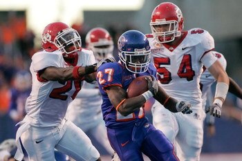 BOISE, ID - NOVEMBER 28: Jeremy Avery #27 of the Boise State Broncos runs against the Fresno State Bulldogs during their game on November 28, 2008 at Bronco Stadium in Boise, Idaho.  (Photo by Otto Kitsinger III/Getty Images)