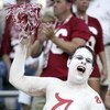 GAINESVILLE, FL - SEPTEMBER 30:  An Alabama Crimson Tida fan cheers his team as they play the Florida Gators at Ben Hill Griffin Stadium at Florida Field September 30, 2006 in Gainsville, Florida.  (Photo by Marc Serota/Getty Images)