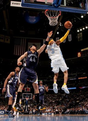 DENVER - APRIL 16:  Allen Iverson #3 of the Denver Nuggets puts up a shot as Andre Brown #44 of the Memphis Grizzlies defends at the Pepsi Center on April 16, 2008 in Denver, Colorado. The Nuggets defeated the Grizzlies 120-111. NOTE TO USER: User express