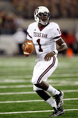 ARLINGTON, TX - OCTOBER 03:  Quarterback Jerrod Johnson #1 of the Texas A&M Aggies drops back to pass against the Arkansas Razorbacks at Cowboys Stadium on October 3, 2009 in Arlington, Texas.  (Photo by Ronald Martinez/Getty Images)
