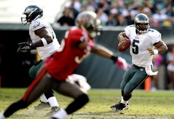 PHILADELPHIA - OCTOBER 11:  Donovan McNabb #5 of the Philadelphia Eagles looks for an open man in a game against the Tampa Bay Buccaneers at Lincoln Financial Field on October 11, 2009 in Philadelphia, Pennsylvania.  (Photo by Jeff Zelevansky/Getty Images