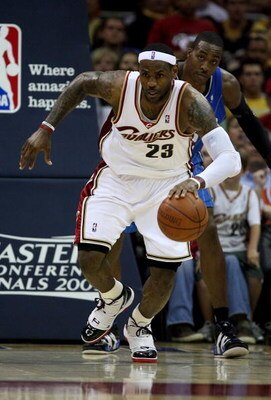 CLEVELAND - MAY 28: LeBron James #23 of the Cleveland Cavaliers brings the ball up court against the Orlando Magic in Game Five of the Eastern Conference Finals during the 2009 Playoffs at Quicken Loans Arena on May 28, 2009 in Cleveland, Ohio. NOTE TO US