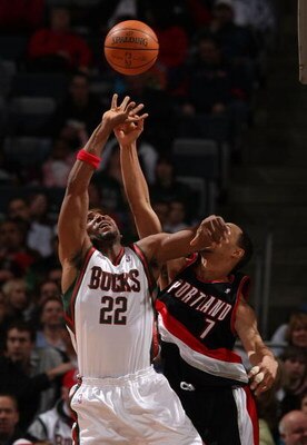 MILWAUKEE - MARCH 07:  Michael Redd #22 of the Milwaukee Bucks battles for a rebound with Brandon Roy #7 of the Portland Trail Blazers at the Bradley Center March 7, 2008 in Milwaukee, Wisconsin. NOTE TO USER: User expressly acknowledges and agrees that, 