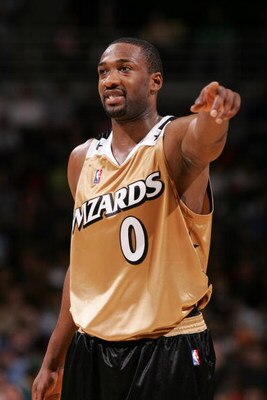 MILWAUKEE - APRIL 1:  Gilbert Arenas #0 of the Washington Wizards points during the game against the Milwaukee Bucks on April 1, 2007 at the Bradley Center in Milwaukee, Wisconsin. The Wizards won 121-107. NOTE TO USER: User expressly acknowledges and agr