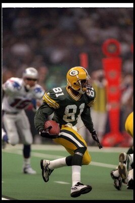 26 Jan 1997:  Wide receiver Desmond Howard of the Green Bay Packers moves the ball during Super Bowl XXXI against the New England Patriots at the Superdome in New Orleans, Louisiana.  The Packers won the game, 35-21. Mandatory Credit: Rick Stewart  /Allsp