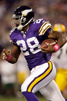 MINNEAPOLIS - OCTOBER 05:  Running back Adrian Peterson #28 of the Minnesota Vikings carries the ball during the game against the Green Bay Packers on October 5, 2009 at Hubert H. Humphrey Metrodome in Minneapolis, Minnesota.  (Photo by Jamie Squire/Getty