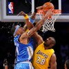 LOS ANGELES, CA - MAY 19:  Kenyon Martin #4 of the Denver Nuggets goes up for a dunk over DJ Mbenga #28 of the Los Angeles Lakers in the second quarter of Game One of the Western Conference Finals during the 2009 NBA Playoffs at Staples Center on May 19, 