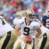 ORCHARD PARK, NY - SEPTEMBER 27:  Quarterback Drew Brees #9 of the New Orleans Saints looks to hand off the ball during the game against the Buffalo Bills at Ralph Wilson Stadium on September 27, 2009 in Orchard Park, New York. The Saints won 27-7. (Photo