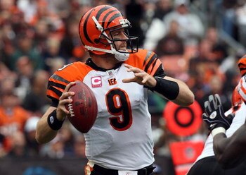 CLEVELAND - OCTOBER 04:  Carson Palmer #9 of the Cincinnati Bengals throws a pass against the Cleveland Browns during their game at Cleveland Browns Stadium on October 4, 2009 in Cleveland, Ohio. The Bengals defeated the Browns 23-20 in overtime.  (Photo 