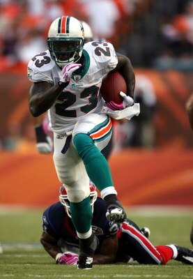 MIAMI - OCTOBER 04:  Running back Ronnie Brown #23 of the Miami Dolphins runs against the Buffalo Bills at Land Shark Stadium on October 4, 2009 in Miami, Florida. Miami defeated Buffalo 31-30.  (Photo by Marc Serota/Getty Images)