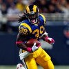 ST. LOUIS - OCTOBER 11:  Running back Steven Jackson #39 of the St. Louis Rams runs the ball against the Minnesota Vikings at Edward Jones Dome on October 11, 2009 in St. Louis, Missouri.  (Photo by Ronald Martinez/Getty Images)
