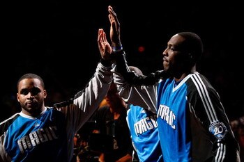ORLANDO, FL - JUNE 11:  Dwight Howard #12 high fives teammate Jameer Nelson #14 of the Orlando Magic before Game Four of the 2009 NBA Finals against the Los Angeles Lakers on June 11, 2009 at Amway Arena in Orlando, Florida.  NOTE TO USER:  User expressly