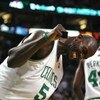 BOSTON - NOVEMBER 10:  Kevin Garnett #5 of the Boston Celtics celebrates in the fourth quarter against the Toronto Raptors on November 10,  2008 at TD Banknorth Garden in Boston, Massachusetts. The Celtics defeated the Toronto Raptors 94-87.  (Photo by El