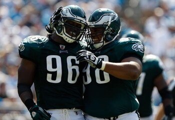 CHARLOTTE, NC - SEPTEMBER 13:  Linebacker Omar Gaither #96 and tackle Mike Patterson of the Philadelphia Eagles celebrate after a sack against the Carolina Panthers during the NFL season opener at Bank of America Stadium on September 13, 2009 in Charlotte