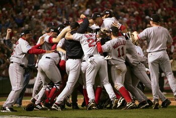 ST LOUIS - OCTOBER 27:   The Boston Red Sox celebrate on the field after defeating the St. Louis Cardinals 3-0 in game four of the World Series on October 27, 2004 at Busch Stadium in St. Louis, Missouri. (Photo by Jed Jacobsohn/Getty Images)
