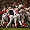 ST LOUIS - OCTOBER 27:   The Boston Red Sox celebrate on the field after defeating the St. Louis Cardinals 3-0 in game four of the World Series on October 27, 2004 at Busch Stadium in St. Louis, Missouri. (Photo by Jed Jacobsohn/Getty Images)