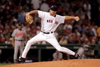 BOSTON - SEPTEMBER 2:  Starting pitcher Lenny DiNardo #55 of the Boston Red Sox pitches in the second inning against the Baltimore Orioles at Fenway Park on September 2, 2005 in Boston, Massachusetts.  (Photo by Jim McIsaac/Getty Images)
