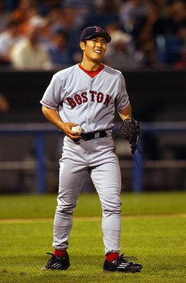CHICAGO - SEPTEMBER 3:  Relief pitcher Byung-Hyun Kim #51 of the Boston Red Sox walks back to the mound during a game against the Chicago White Sox on September 3, 2003 at U.S. Cellular Field in Chicago, Illinois. The Red Sox defeated the White Sox 5-4 in
